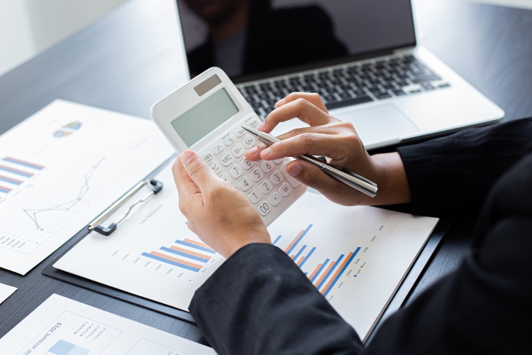 man using calculator 