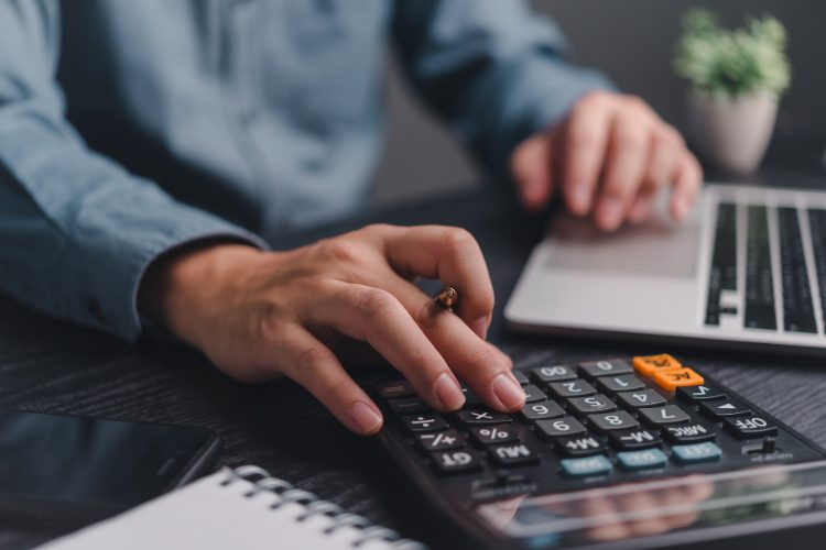 man using calculator
